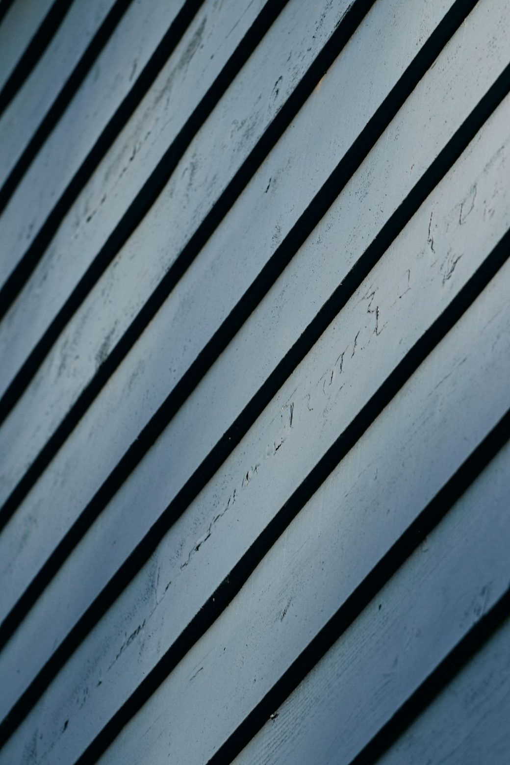 Closeup of weathered gray siding