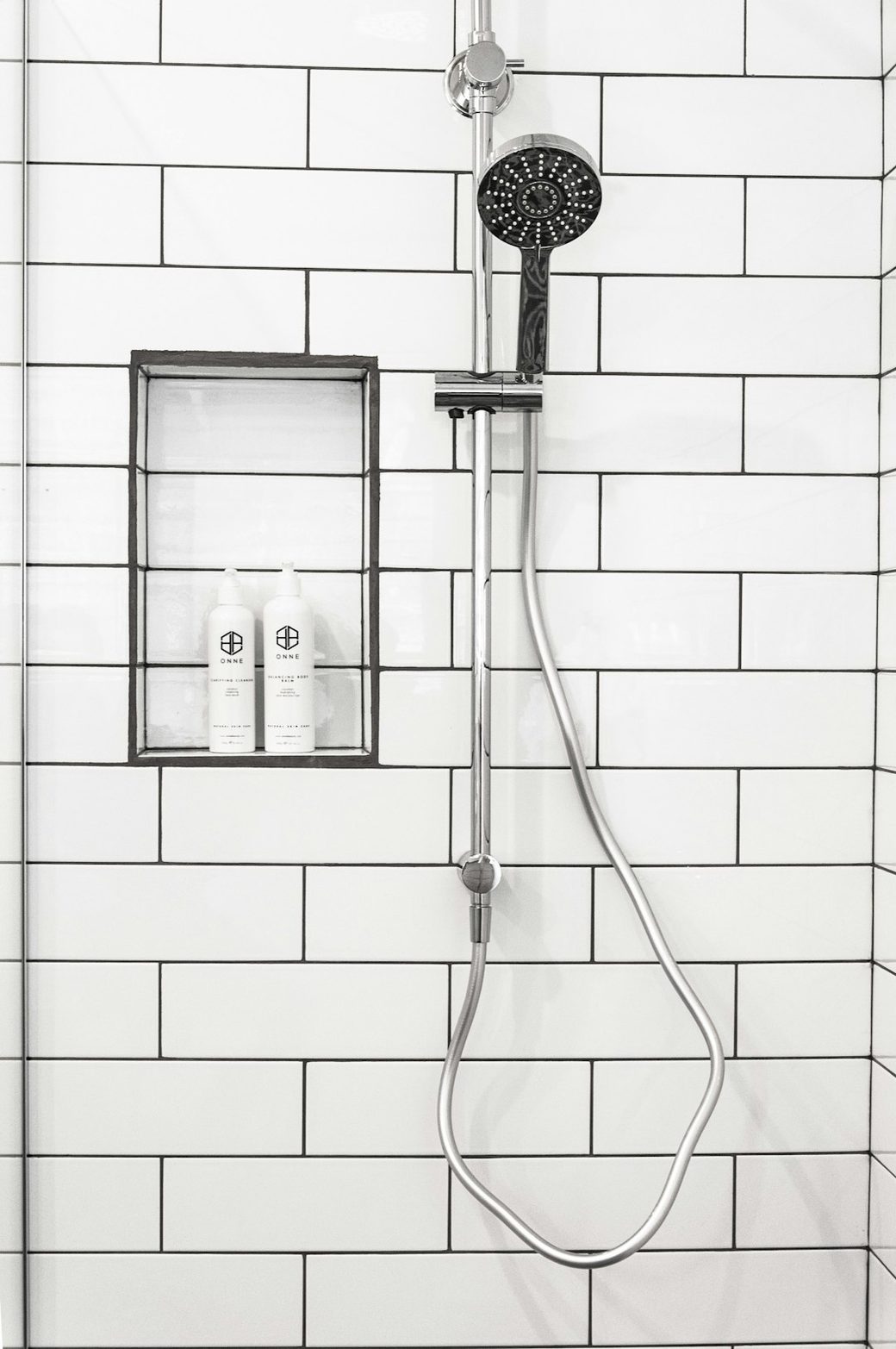 Shower head and subway tile wall