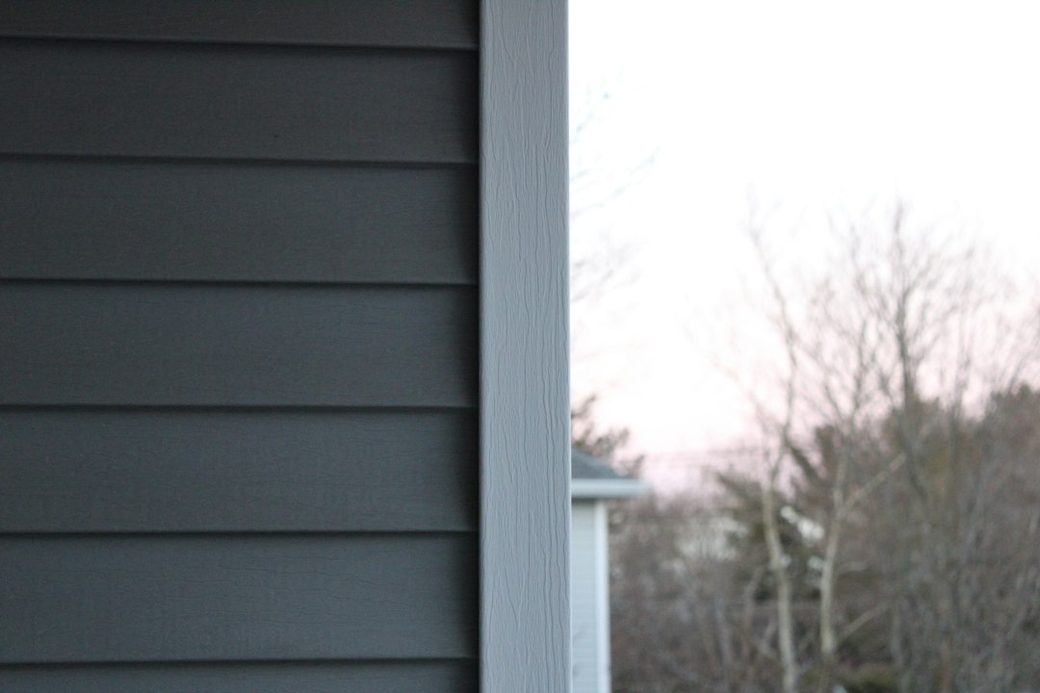 New siding corner closeup on a modern house
