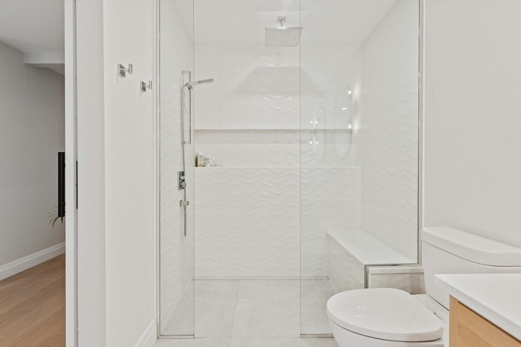 Walk-in glass tile shower