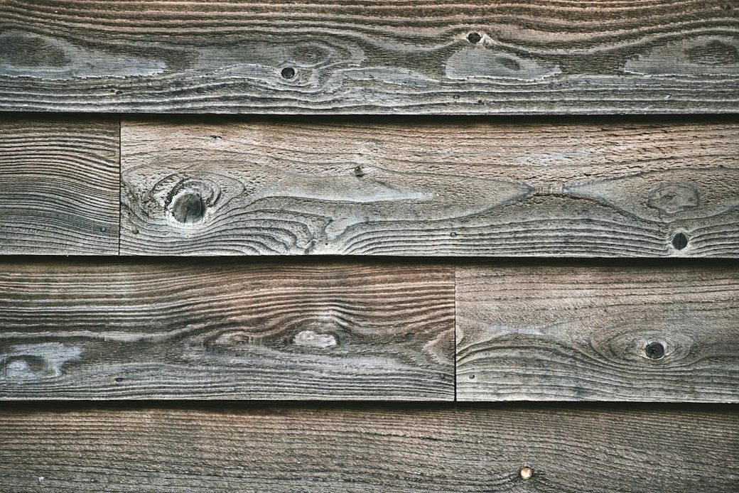 Weathered wood siding closeup with grain