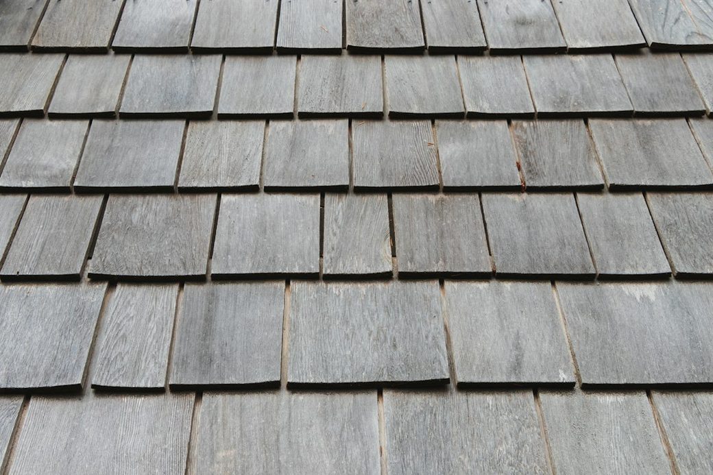 Closeup of weathered wood shingle siding