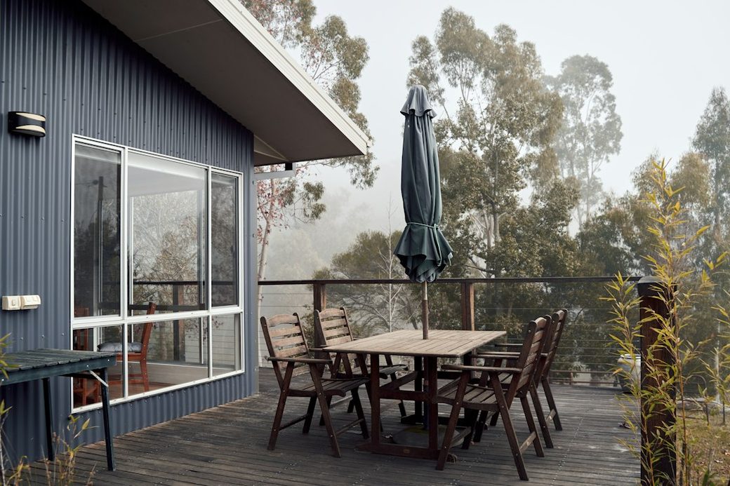 Foggy morning around a house exterior